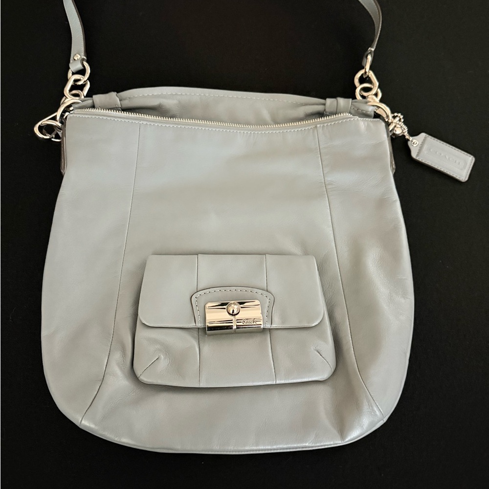Coach bag. Medium size. Grayish in color.